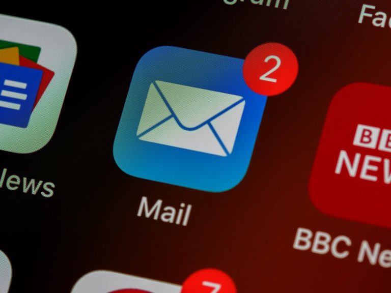 A phone home screen covered in unread notification badges