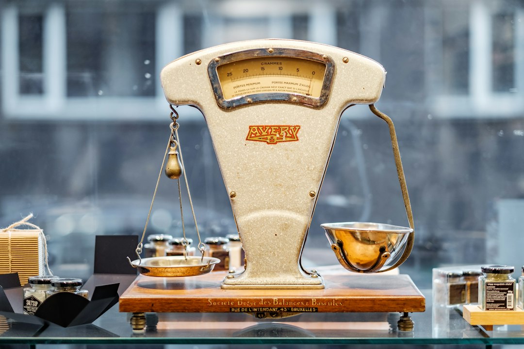 A set of balance scales on a desk