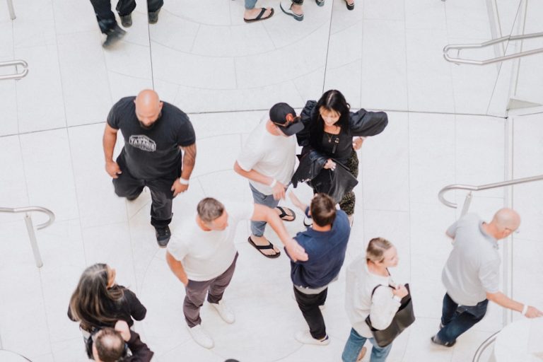 A small group of people gathered in a room